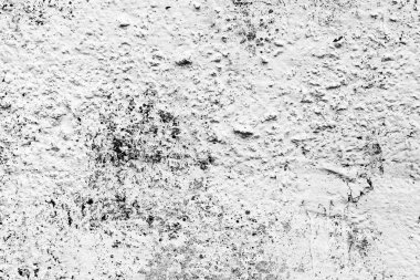 Çatlakları ve çizikleri olan beton bir duvarın dokusu arka plan olarak kullanılabilir.