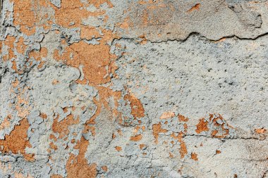 Çatlakları ve çizikleri olan beton bir duvarın dokusu arka plan olarak kullanılabilir.