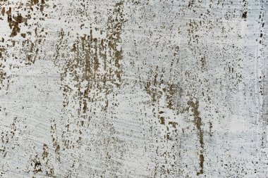 Çatlakları ve çizikleri olan beton bir duvarın dokusu arka plan olarak kullanılabilir.