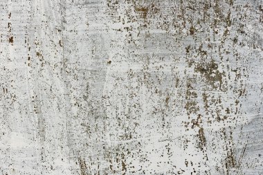 Çatlakları ve çizikleri olan beton bir duvarın dokusu arka plan olarak kullanılabilir.