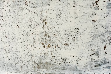 Çatlakları ve çizikleri olan beton bir duvarın dokusu arka plan olarak kullanılabilir.