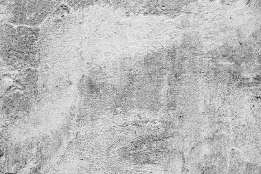 Çatlakları ve çizikleri olan beton bir duvarın dokusu arka plan olarak kullanılabilir.