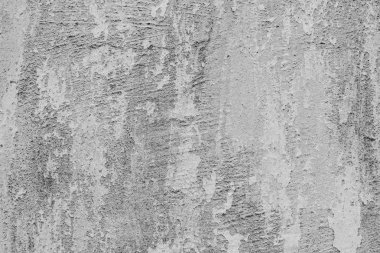 Çatlakları ve çizikleri olan beton bir duvarın dokusu arka plan olarak kullanılabilir.