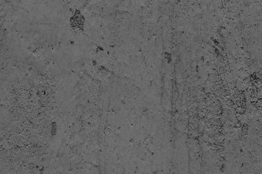 Çatlakları ve çizikleri olan beton bir duvarın dokusu arka plan olarak kullanılabilir.