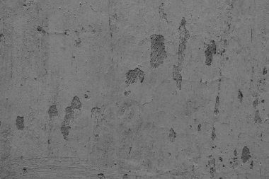 Çatlakları ve çizikleri olan beton bir duvarın dokusu arka plan olarak kullanılabilir.