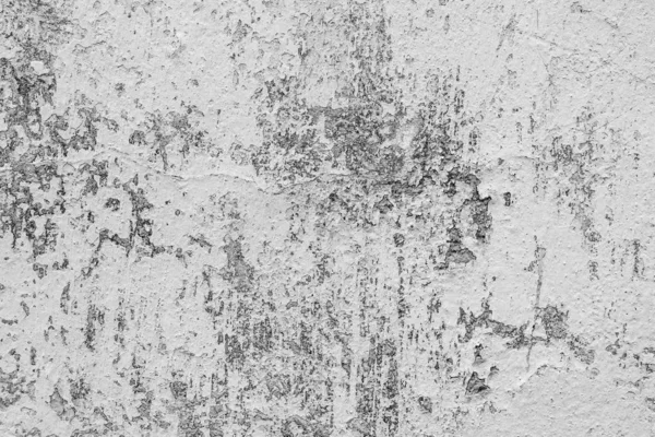 Çatlakları ve çizikleri olan beton bir duvarın dokusu arka plan olarak kullanılabilir.