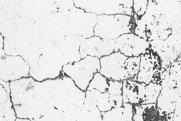 Çatlakları ve çizikleri olan beton bir duvarın dokusu arka plan olarak kullanılabilir.