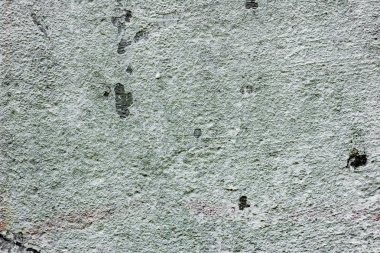 Çatlakları ve çizikleri olan beton bir duvarın dokusu arka plan olarak kullanılabilir.