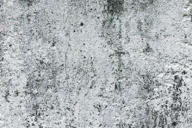 Çatlakları ve çizikleri olan beton bir duvarın dokusu arka plan olarak kullanılabilir.