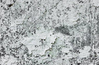 Çatlakları ve çizikleri olan beton bir duvarın dokusu arka plan olarak kullanılabilir.
