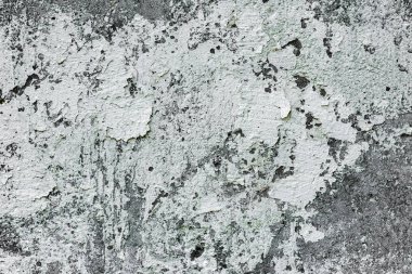 Çatlakları ve çizikleri olan beton bir duvarın dokusu arka plan olarak kullanılabilir.