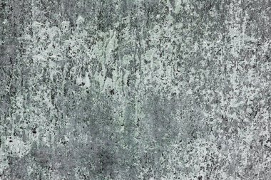 Çatlakları ve çizikleri olan beton bir duvarın dokusu arka plan olarak kullanılabilir.