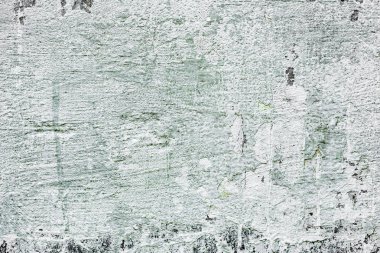 Çatlakları ve çizikleri olan beton bir duvarın dokusu arka plan olarak kullanılabilir.