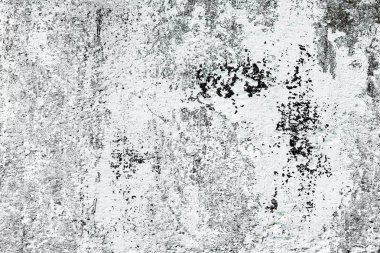 Çatlakları ve çizikleri olan beton bir duvarın dokusu arka plan olarak kullanılabilir.