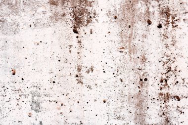 Çatlakları ve çizikleri olan beton bir duvarın dokusu arka plan olarak kullanılabilir.