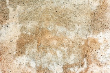 Çatlakları ve çizikleri olan beton bir duvarın dokusu arka plan olarak kullanılabilir.