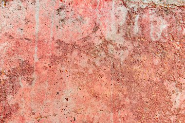 Çatlakları ve çizikleri olan beton bir duvarın dokusu arka plan olarak kullanılabilir.