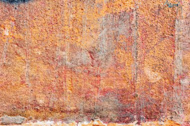 Çatlakları ve çizikleri olan beton bir duvarın dokusu arka plan olarak kullanılabilir.