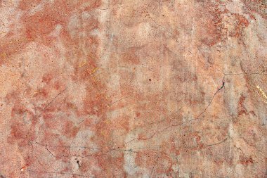 Çatlakları ve çizikleri olan beton bir duvarın dokusu arka plan olarak kullanılabilir.