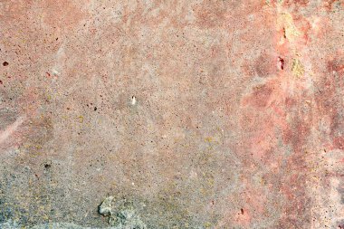 Çatlakları ve çizikleri olan beton bir duvarın dokusu arka plan olarak kullanılabilir.