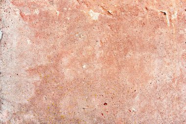 Çatlakları ve çizikleri olan beton bir duvarın dokusu arka plan olarak kullanılabilir.