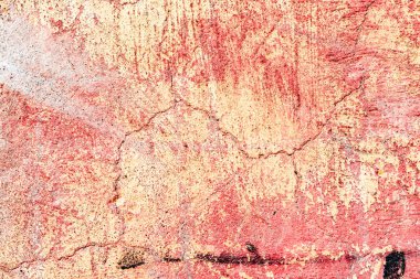 Çatlakları ve çizikleri olan beton bir duvarın dokusu arka plan olarak kullanılabilir.