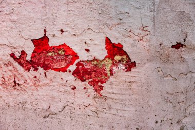 Çatlakları ve çizikleri olan beton bir duvarın dokusu arka plan olarak kullanılabilir.