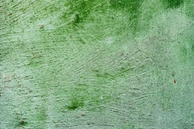 Çatlakları ve çizikleri olan beton bir duvarın dokusu arka plan olarak kullanılabilir.