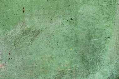 Çatlakları ve çizikleri olan beton bir duvarın dokusu arka plan olarak kullanılabilir.