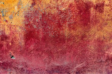 Çatlakları ve çizikleri olan beton bir duvarın dokusu arka plan olarak kullanılabilir.