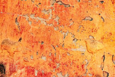 Çatlakları ve çizikleri olan beton bir duvarın dokusu arka plan olarak kullanılabilir.