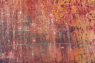 Çatlakları ve çizikleri olan beton bir duvarın dokusu arka plan olarak kullanılabilir.