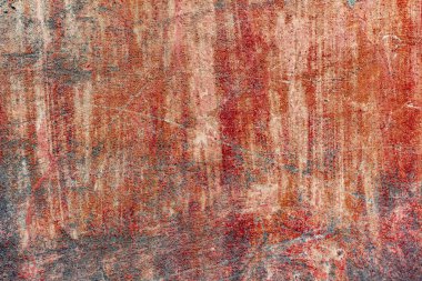 Çatlakları ve çizikleri olan beton bir duvarın dokusu arka plan olarak kullanılabilir.