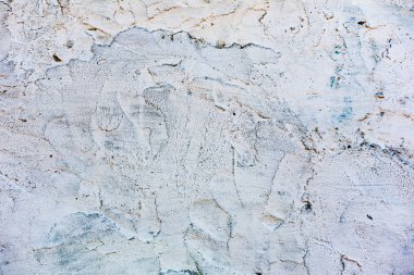 Çatlakları ve çizikleri olan tuğla duvar dokusu arka plan olarak kullanılabilir.