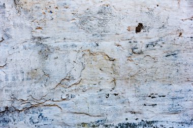 Çatlakları ve çizikleri olan tuğla duvar dokusu arka plan olarak kullanılabilir.