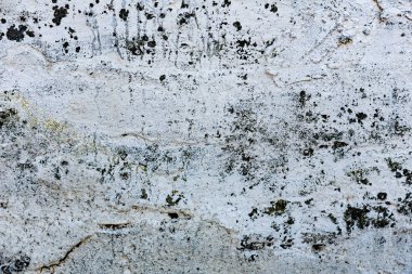 Çatlakları ve çizikleri olan tuğla duvar dokusu arka plan olarak kullanılabilir.