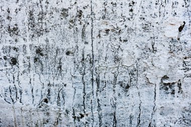 Çatlakları ve çizikleri olan tuğla duvar dokusu arka plan olarak kullanılabilir.