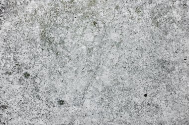 Çatlakları ve çizikleri olan beton bir duvarın dokusu arka plan olarak kullanılabilir.