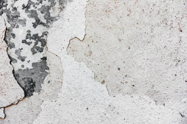Çatlakları ve çizikleri olan beton bir duvarın dokusu arka plan olarak kullanılabilir.