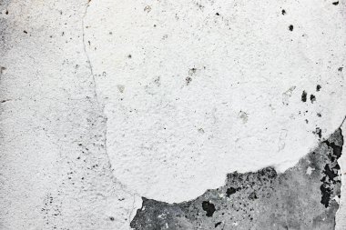 Çatlakları ve çizikleri olan beton bir duvarın dokusu arka plan olarak kullanılabilir.