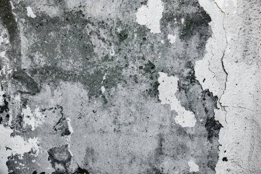 Çatlakları ve çizikleri olan beton bir duvarın dokusu arka plan olarak kullanılabilir.