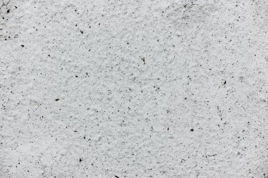 Çatlakları ve çizikleri olan beton bir duvarın dokusu arka plan olarak kullanılabilir.