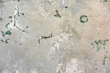 Çatlakları ve çizikleri olan beton bir duvarın dokusu arka plan olarak kullanılabilir.