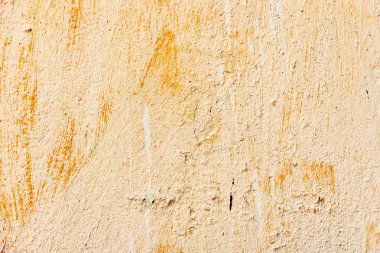 Çatlakları ve çizikleri olan beton bir duvarın dokusu arka plan olarak kullanılabilir.