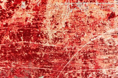 Çatlakları ve çizikleri olan beton bir duvarın dokusu arka plan olarak kullanılabilir.