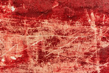 Çatlakları ve çizikleri olan beton bir duvarın dokusu arka plan olarak kullanılabilir.