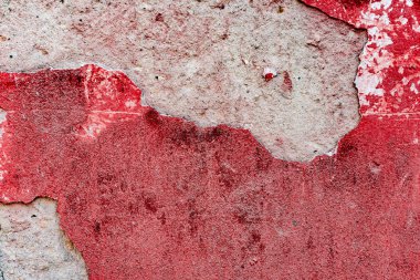 Çatlakları ve çizikleri olan beton bir duvarın dokusu arka plan olarak kullanılabilir.