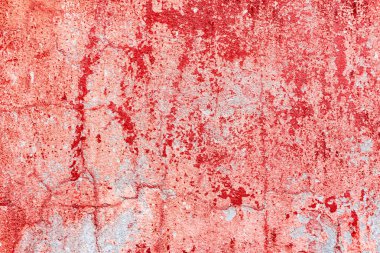 Çatlakları ve çizikleri olan beton bir duvarın dokusu arka plan olarak kullanılabilir.