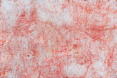 Çatlakları ve çizikleri olan beton bir duvarın dokusu arka plan olarak kullanılabilir.