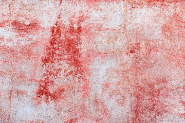 Çatlakları ve çizikleri olan beton bir duvarın dokusu arka plan olarak kullanılabilir.